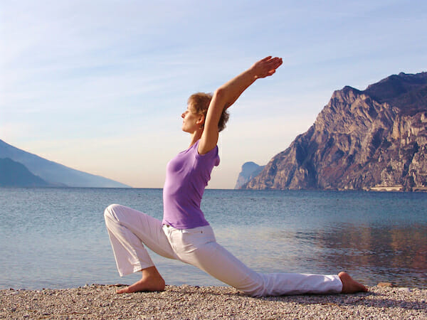 The magic sunrise at Lake Garda. Pink shades and fabulous landscapes Summer Tips  