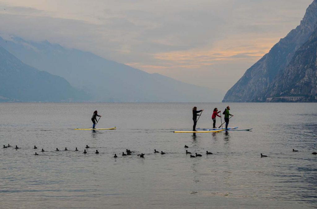 Sup. All seasons are the right ones for this sport at lake garda trentino Autumn Outdoor Spring Summer Winter  